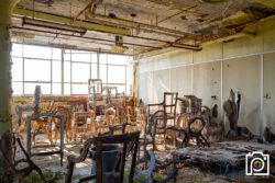 This building was temporarily home to an upholstery shop, which explains all of the chair frames.